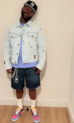 Floyd Mayweather’s Outfit in Louis Vuitton Jacket, Nike Sneakers & Undefeated (2025)
