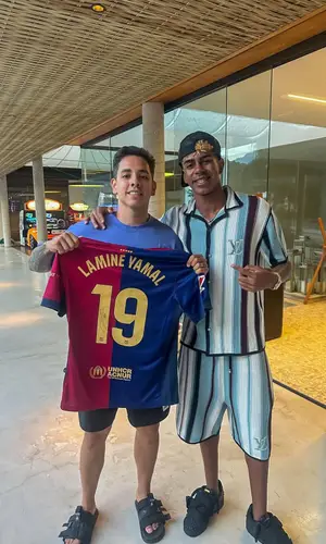 Lamine Yamal wearing Louis Vuitton shirt