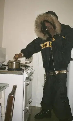 Playboi Carti’s Outfit in Marking Distance Jacket, Davidenth Pants & Chrome Hearts Jewelry (2025)
