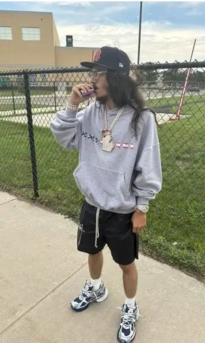 BabyTron’s Outfit in Balenciaga Hoodie, Rick Owens Shorts & New Era Cap (2025)