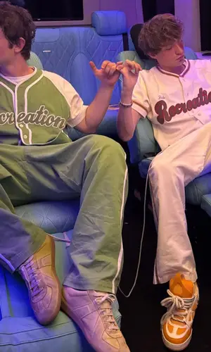 Ian wearing Bode pants