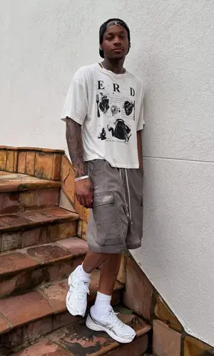 Tylil James wearing Enfants Riches Deprimes t-shirt