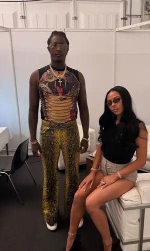 Young Thug wearing Louis Vuitton bag
