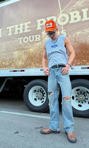 Tyler Herro’s Outfit in Urban Outfitters Top, Balenciaga Jeans & Acne Studios Boots (2025)