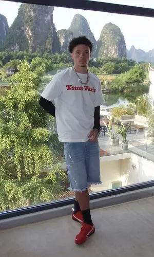 Lil Mosey’s Outfit in Kenzo T-Shirt, Gallery Dept. Shorts & Balenciaga Sneakers (2025)