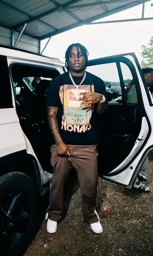 Fredo Bang’s Outfit in Rhude T-Shirt, Nike Sneakers & Audemars Piguet Watch (2025)