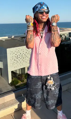 Lil Pump’s Outfit in Louis Vuitton Shirt, Prada Eyewear & Denim Tears Hat (2025)
