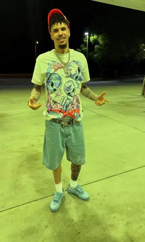 LaMelo Ball’s Outfit in LaFrance Shorts, Louis Vuitton Boots & B.B. Simon Belt (2025)