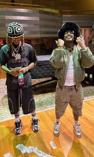 Lil Gnar’s Outfit in Balenciaga T-Shirt, Rick Owens Shorts & Urban Outfitters Hat (2025)