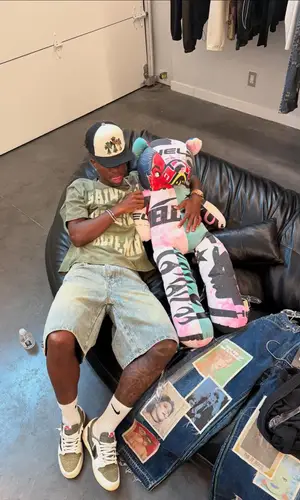 Vinicius Jr’s Outfit in Travis Scott Merch Sneakers, Chrome Hearts Cap & Nike Socks (2025)