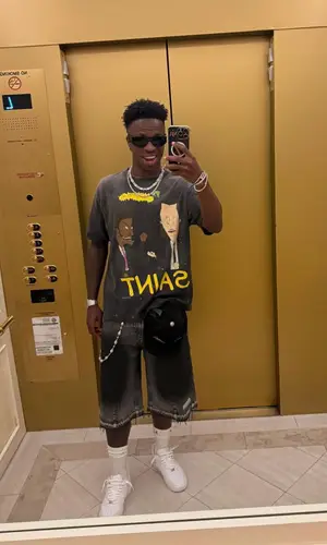 Vinicius Jr’s Outfit in Saint Michael T-Shirt, PDF Shorts & Nike Socks (2025)