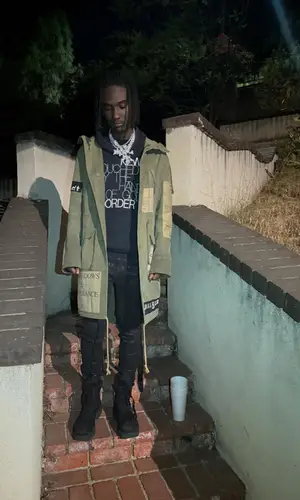 OsamaSon wearing Raf Simons jacket