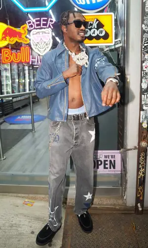 Lil Tjay’s Outfit in Enfants Riches Deprimes Jacket & Chrome Hearts Eyewear (2026)