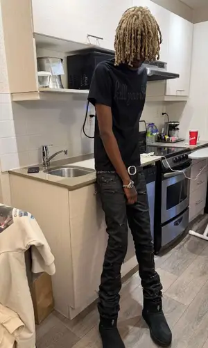 Bleood wearing Dior pants
