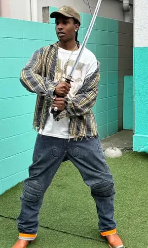 ASAP Rocky wearing Chanel cap