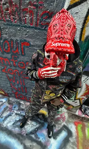 Fenix Flexin wearing Supreme pants