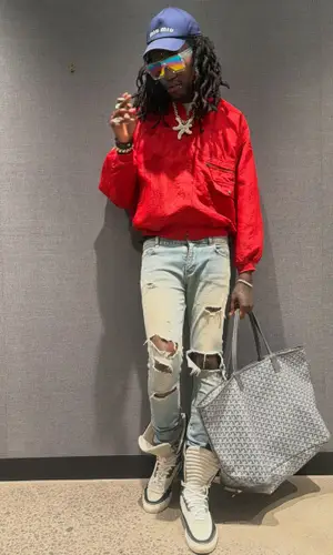 diamond* wearing Issey Miyake jacket