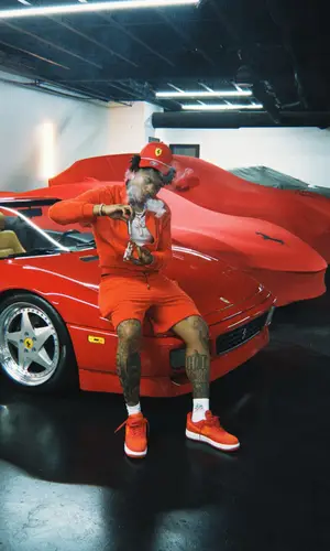 Lil Baby’s Outfit in Louis Vuitton Jacket, Puma Cap & Ferrari (2026)