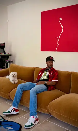 Kid Cudi’s Outfit in Bape Shirt, Audemars Piguet Watch & New Era Cap (2026)