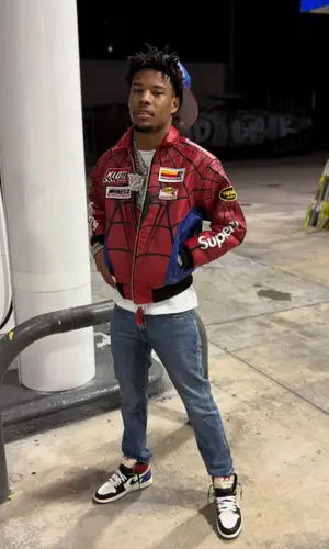 Nardo Wick wearing New Era cap