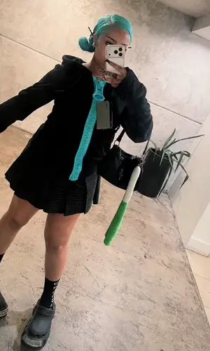 North West wearing Balenciaga sandal