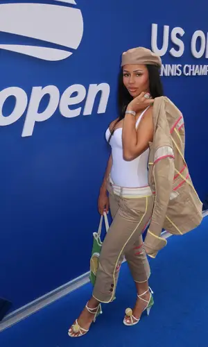 Mariah the Scientist wearing Chanel bag