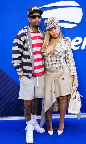 21 Savage wearing Miu Miu shirt