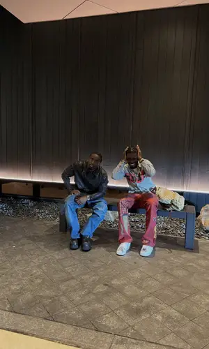Bruce Ray wearing Gucci backpack