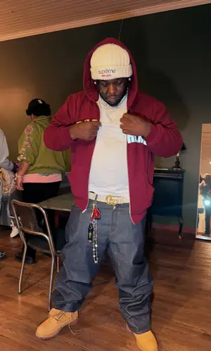 Rio Da Yung Og wearing Gucci belt