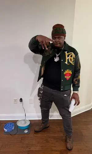 Fatt Smaxk wearing Louis Vuitton belt