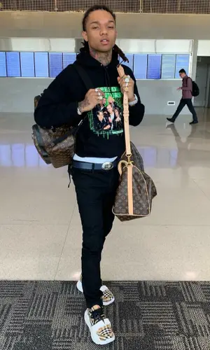 Swae Lee wearing Louis Vuitton backpack