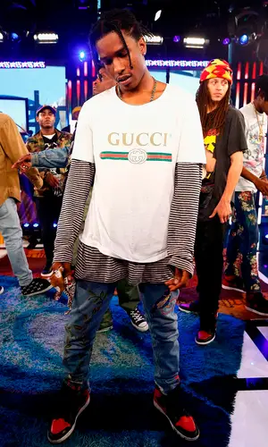 ASAP Rocky wearing Guess top