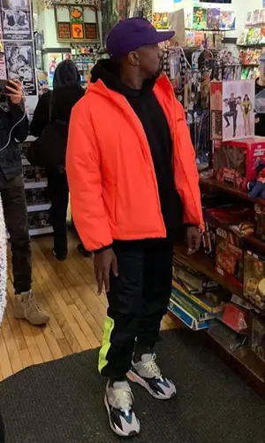 Kanye West wearing Yeezy hoody