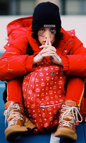 Lil Xan wearing Gucci sneakers