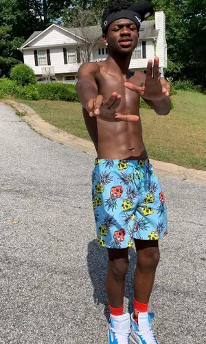 Lil Nas X wearing H&M sock
