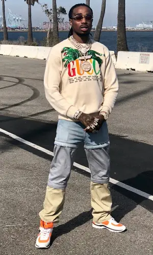 Quavo wearing Gucci sweatshirt