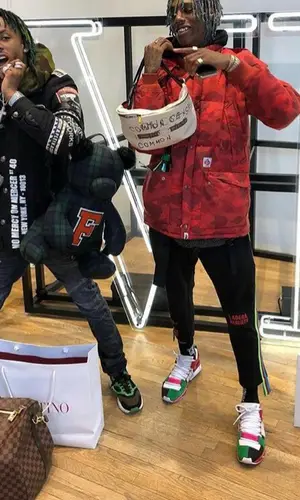 Rich The Kid wearing Puma backpack