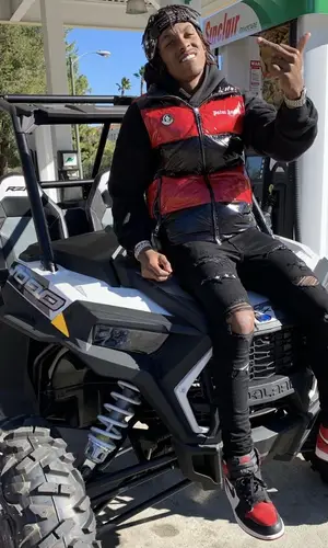 Rich The Kid wearing Moncler other