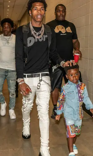 Lil Baby wearing Dior sweater
