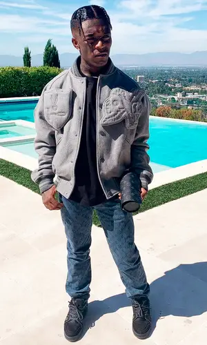 Lil Uzi Vert wearing Louis Vuitton watch