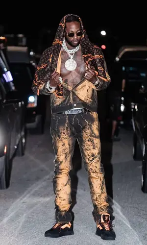 2 Chainz wearing Louis Vuitton scarf