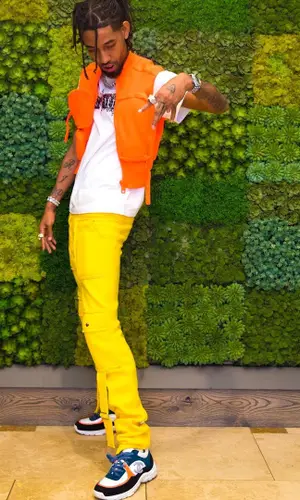 PnB Rock wearing Louis Vuitton other
