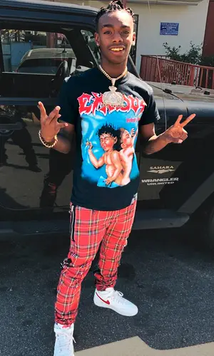 YNW Melly wearing Tripp NYC pants