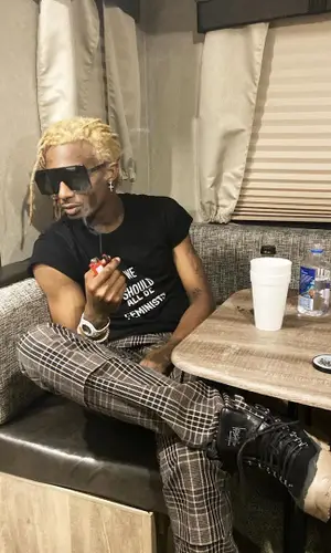 Playboi Carti wearing Dior t-shirt
