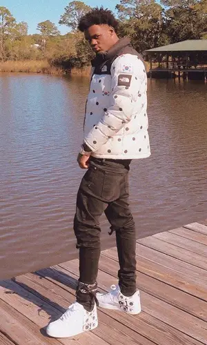 Ugly God wearing The North Face jacket