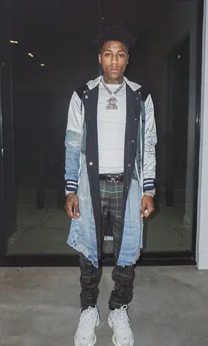 NBA YoungBoy wearing Undercover trousers