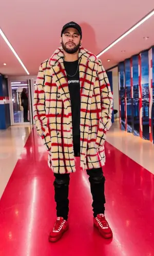 Neymar wearing Supreme sweatshirt