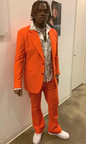 Gunna wearing Acne Studios suit