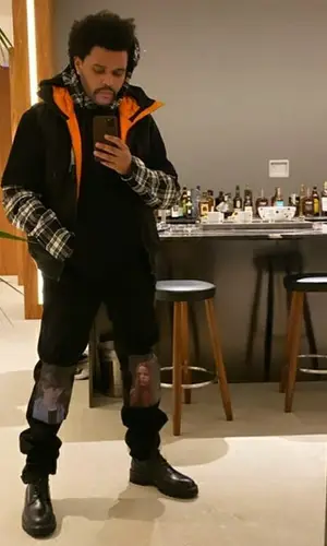 The Weeknd wearing Dr. Martens boots