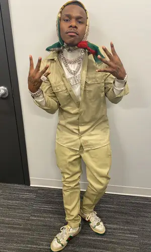 DaBaby wearing Gucci scarf